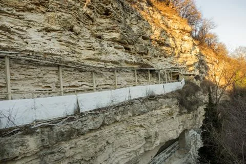 Picturesque background of collapsing surface of limestone rock. Abstract beau Stock Photos