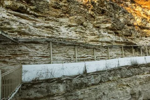 Picturesque background of collapsing surface of limestone rock. Abstract beau Stock Photos