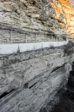 Picturesque background of collapsing surface of limestone rock. Abstract beau Stock Photos