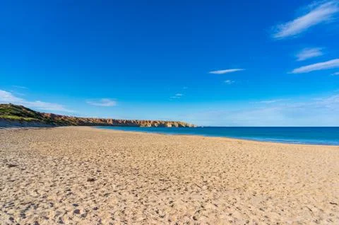 Picturesque beach landscape with cliffs Stock Photos
