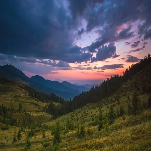 The picturesque cloud stream against the background of a mountain. Wide angle Stock Footage 69482910