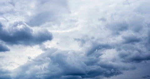Picturesque cumulus clouds float in blue sky on windy day 스톡 동영상 140326660