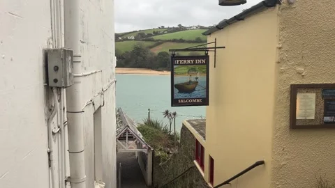 A picturesque drone video of an old pub near Salcombe on a hot and sunny day 스톡 동영상 301762952