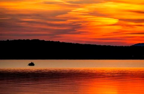 Picturesque Golden sunset over a calm lake, summer, lake Uvildy, southern Ura Stock Photos