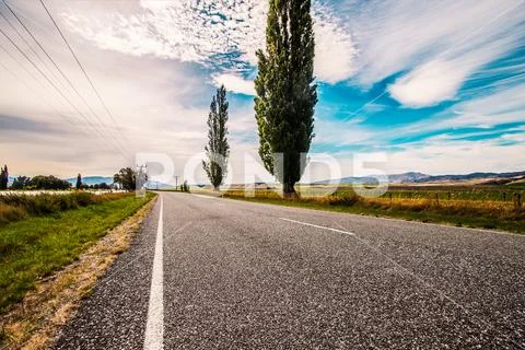 Picturesque landscape scene road Stock Photos