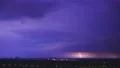 The picturesque lightning above the night city 4k or 4k+ Resolution