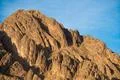 The picturesque mountain on the background of a blue sky Photo