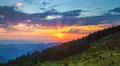 The picturesque mountain hill on the background of sunset. Time lapse 4k or 4k+ Resolution