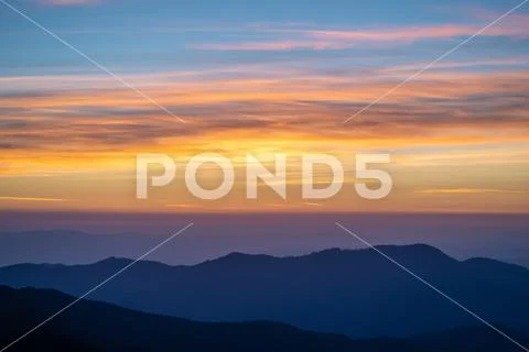 The picturesque mountain landscape on the sunset background Stock Photos