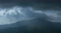 The picturesque mountain view on the background of cloud stream. Time lapse 4k or 4k+ Resolution