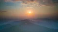 The picturesque mountain view on the background of sunset. Time lapse 4k or 4k+ Resolution