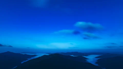 The picturesque mountains on the cloud stream background. evening night time Video stock 95210358