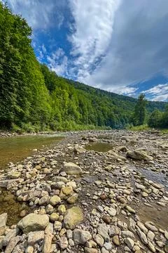 The picturesque Prut River flows through scenic Carpathian landscapes Stock Photos