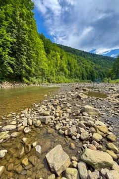 The picturesque Prut River flows through scenic Carpathian landscapes Stock Photos