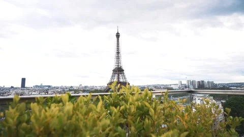 This is a picturesque scene of the Eiffel Tower seen from a Parisian balcony Stock Footage 276836743
