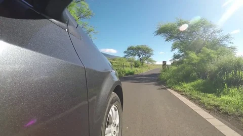 Picturesque Side Point Of View Of A Black Car Driving Down A Narrow Empty Road 스톡 동영상 83927782
