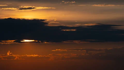 The picturesque sunrise on the cloud stream background. time lapse Video stock 110404859