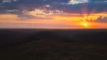The picturesque sunset above mountains. time lapse 4k or 4k+ Resolution