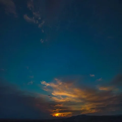 The picturesque sunset on the background of cloud stream. Wide angle. Time lapse Stock Footage 69445232
