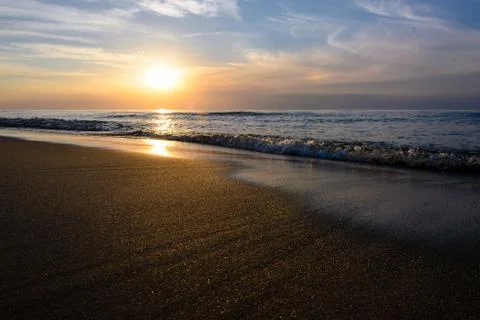 Picturesque sunset on the beach Stock Photos