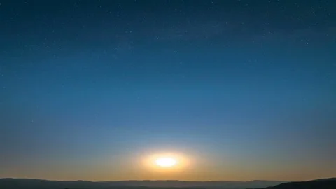 The picturesque sunset on the starry sky background. time lapse Video stock 80425856