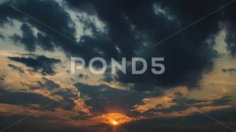 The picturesque sunset (sunrise) with clouds, wide angle view Stock Photos
