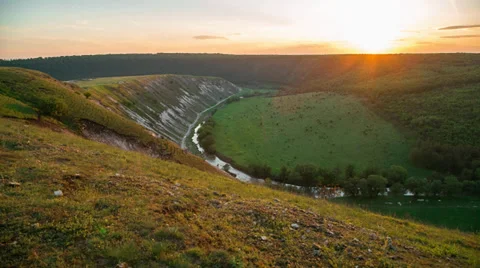 Picturesque sunset in a valley with a river Stock Footage 37812965