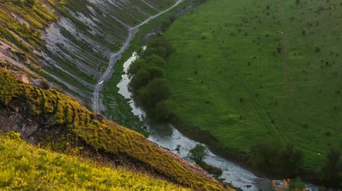 Picturesque sunset in a valley with a river Stock Footage 38046030