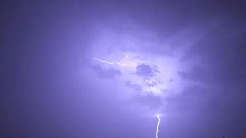 The picturesque thunderstorm with lightning in the night sky. slow motion Stock Footage 93905821