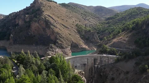 Picturesque view of river between rocky cliffs near arch dam Stock Footage 260411968