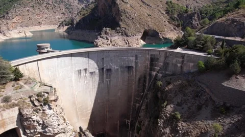 Picturesque view of river between rocky cliffs near arch dam Stock Footage 260412130