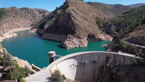 Picturesque view of river between rocky cliffs near arch dam Stock Footage 260412237