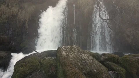 Picturesque waterfall in the forest in the mountains Video stock 171354119