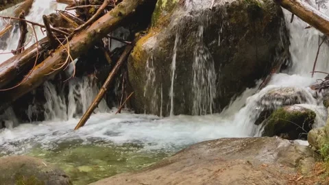Picturesque waterfall from a mountain river in the forest Stock Footage 160861442
