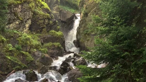 Picturesque waterfall from a mountain river in the forest Stock Footage 160862277