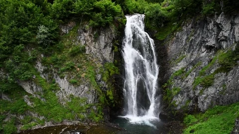 Picturesque waterfall in the mountains. (Sauth deth Pish) Stock Footage 167903281