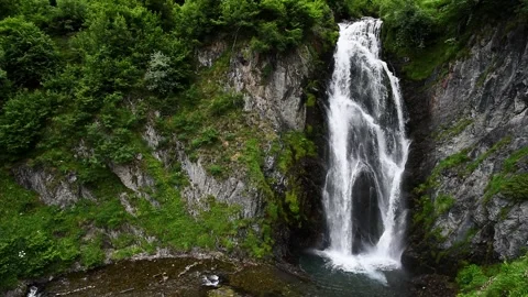 Picturesque waterfall in the mountains. (Sauth deth Pish) Stock Footage 167905295