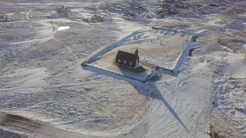 Picturesque winter landscape with famous picturesque black church of Budir. Stock Footage