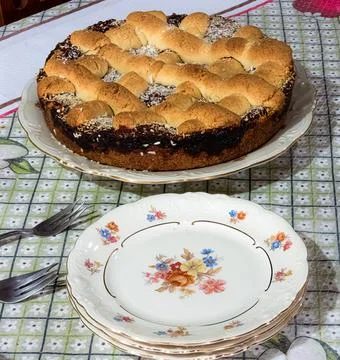 Pie and plates Stock Photos