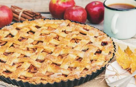 Pie with apples and cinnamon. Selective focus. Stock Photos