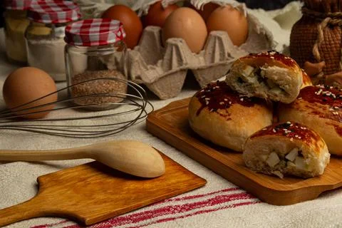 Pie baking concept, baking ingredients in the background and foreground Stock Photos