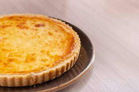 Pie with curd on the tray, top view. Place for text Stock Photos