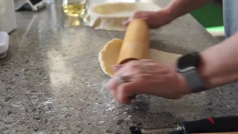 Pie dough preparation with rolling pin Stock Footage 131113326