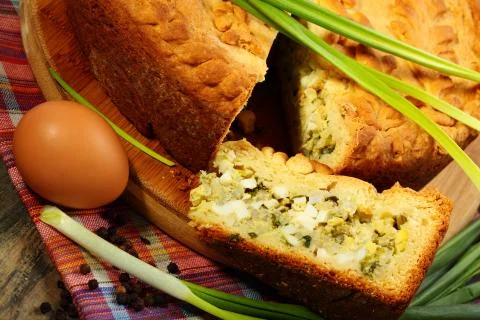 Pie with egg and onion stuffing. Stock Photos