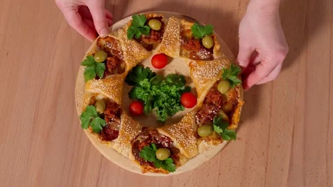 Pie filled with potatoes and bacon on a wooden round board. Stock Footage 264141494
