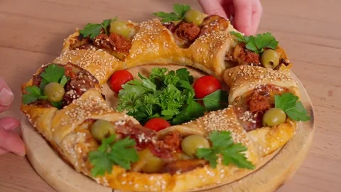 Pie filled with potatoes and bacon on a wooden round board. Stock Footage 264141495