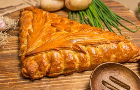 Pie with onions and eggs Stock Photos