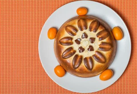 Pie on orange background top view Stock Photos