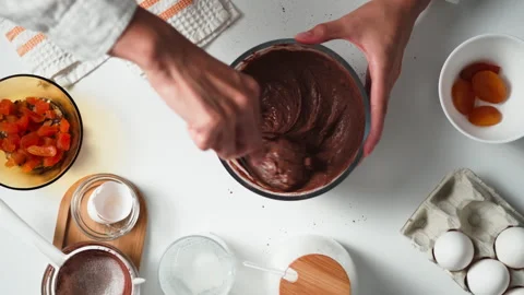 Pie recipe step by step. Mixing chocolate dough from cocoa powder and flour 動画素材 247363107