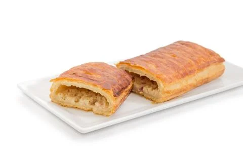 Pie with savory topping on a small rectangular dish Stock Photos